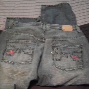 Rocawear Men's Light Blue Denim Jeans with Red Embroidered Accents